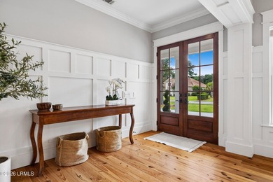 Nestled on a private wooded homesite in Hampton Hall, this - photo 9