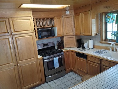 This unique home has incredible, beachfront on scenic Ess Lake - photo 29