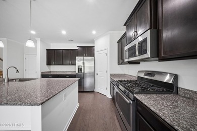 Welcome home to this beautiful 4-bedroom, 2.5-bath home in the - photo 7