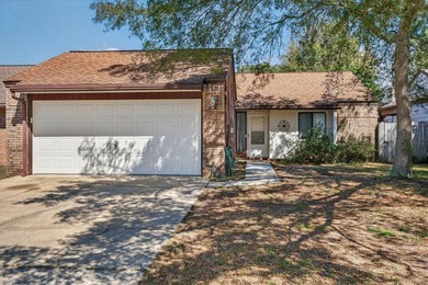 Discover this beautifully maintained garden home in the - photo 1