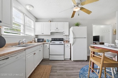 This charming, affordable two bedroom cottage brings easy living - photo 13