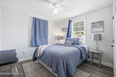 This charming, affordable two bedroom cottage brings easy living - photo 18