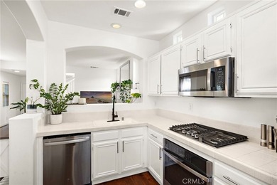 Bright, welcoming and impressively updated inside and out, this - photo 18