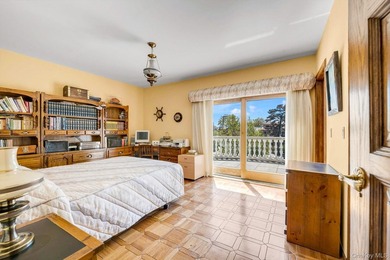 Set on a half-acre with 128 feet of direct waterfront, this 6 - photo 27