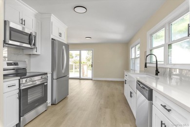 Welcome to this beautifully updated 4-bedroom, 2-bath home - photo 9