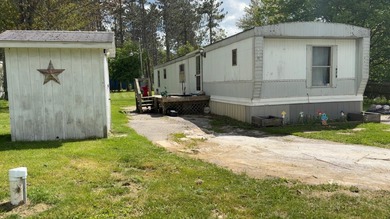 Tittabawassee River Home For Sale in Sanford Michigan