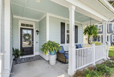 Beautifully set on a private, wooded lot in the sought-after - photo 5
