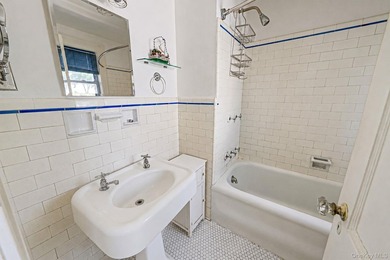 Welcome Home To This Charming Merrick Cape Cod Nestled Mid Block - photo 15