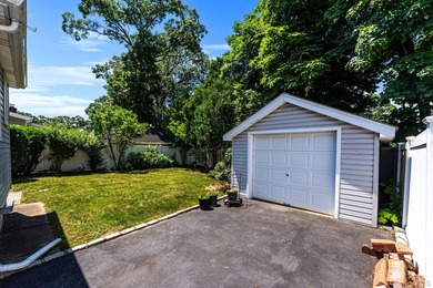Welcome Home To This Charming Merrick Cape Cod Nestled Mid Block - photo 18