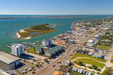 Welcome to Atlantic Harbour J-1, an updated end-unit condo with - photo 45