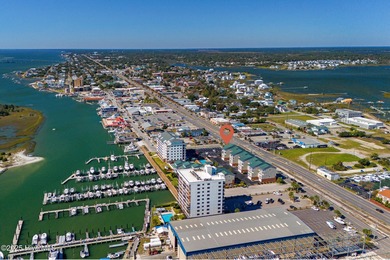 Welcome to Atlantic Harbour J-1, an updated end-unit condo with - photo 46