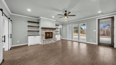 This proposed Ava plan features 3 beds 2 full baths, a - photo 2