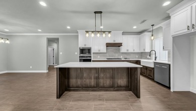 This proposed Ava plan features 3 beds 2 full baths, a - photo 3