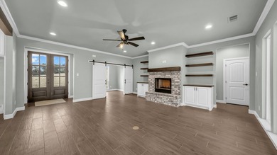 This proposed Ava plan features 3 beds 2 full baths, a - photo 7