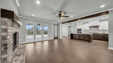This proposed Ava plan features 3 beds 2 full baths, a - photo 9