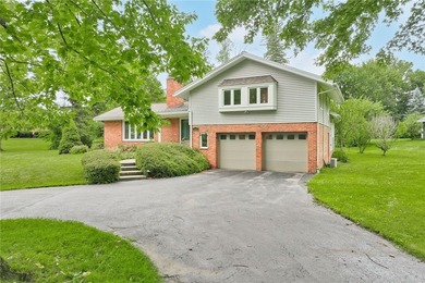 Welcome to 395 Ridgemont Drive, a beautifully maintained brick - photo 1