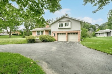 Welcome to 395 Ridgemont Drive, a beautifully maintained brick - photo 3