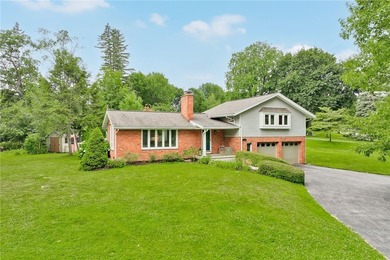 Welcome to 395 Ridgemont Drive, a beautifully maintained brick - photo 4