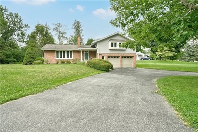 Welcome to 395 Ridgemont Drive, a beautifully maintained brick - photo 5