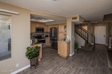 Located in a highly desired golf course complex, this - photo 11