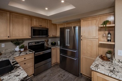 Located in a highly desired golf course complex, this - photo 12