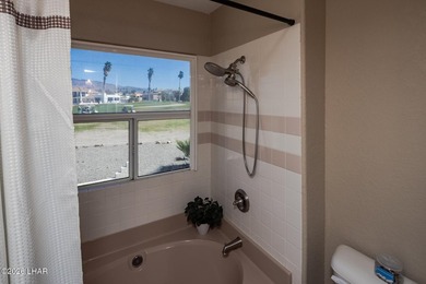 Located in a highly desired golf course complex, this - photo 20