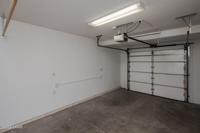 Located in a highly desired golf course complex, this - photo 31
