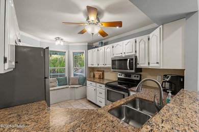 Tucked away within the gated community of Harbor Island, this - photo 8