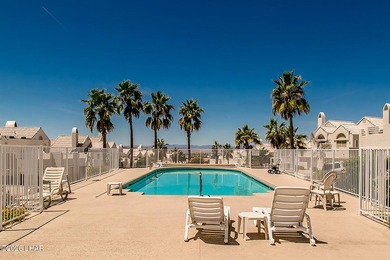 Located in a highly desired golf course complex, this - photo 58