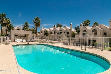 Located in a highly desired golf course complex, this - photo 60