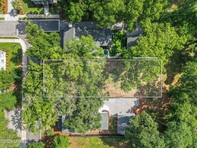 Nestled beneath majestic live oak trees, this exceptional - photo 3