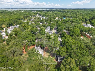 Nestled beneath majestic live oak trees, this exceptional - photo 4