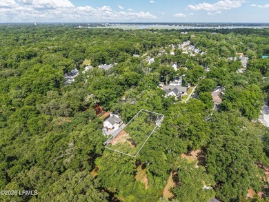 Nestled beneath majestic live oak trees, this exceptional - photo 5