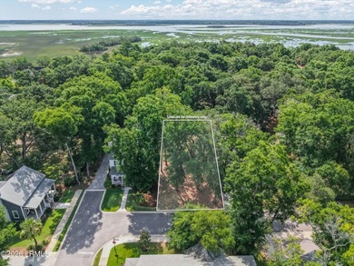 Nestled beneath majestic live oak trees, this exceptional - photo 6