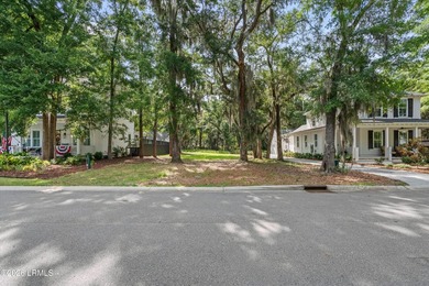 Nestled beneath majestic live oak trees, this exceptional - photo 9