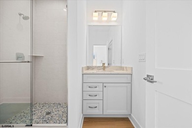 Experience exceptional coastal living in this stunning new - photo 23