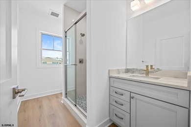 Experience exceptional coastal living in this stunning new - photo 24