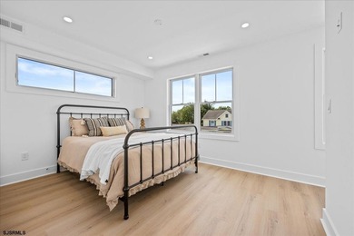Experience exceptional coastal living in this stunning new - photo 25