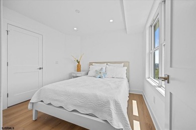 Experience exceptional coastal living in this stunning new - photo 31