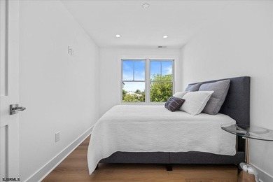 Experience exceptional coastal living in this stunning new - photo 32