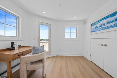 Experience exceptional coastal living in this stunning new - photo 49