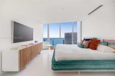 Rising 52 stories above Miami, this move-in ready 1,699 SF