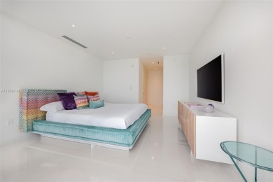 Rising 52 stories above Miami, this move-in ready 1,699 SF