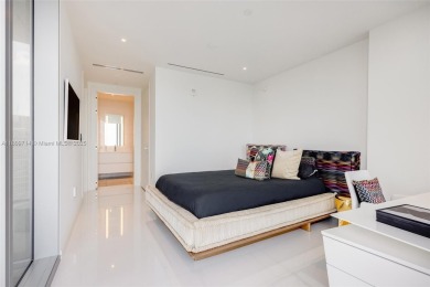 Rising 52 stories above Miami, this move-in ready 1,699 SF