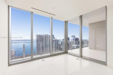 Rising 52 stories above Miami, this move-in ready 1,699 SF