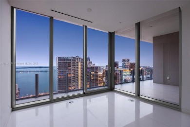 Rising 52 stories above Miami, this move-in ready 1,699 SF