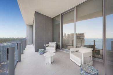Rising 52 stories above Miami, this move-in ready 1,699 SF