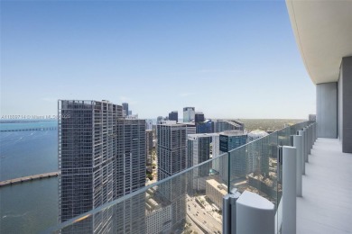 Rising 52 stories above Miami, this move-in ready 1,699 SF