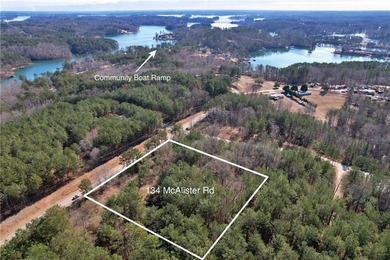 This nearly three-acre, level interior lake lot offers the - photo 2