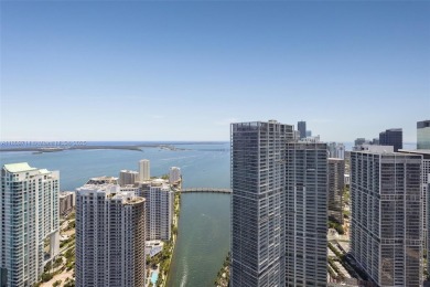 Rising 52 stories above Miami, this move-in ready 1,699 SF